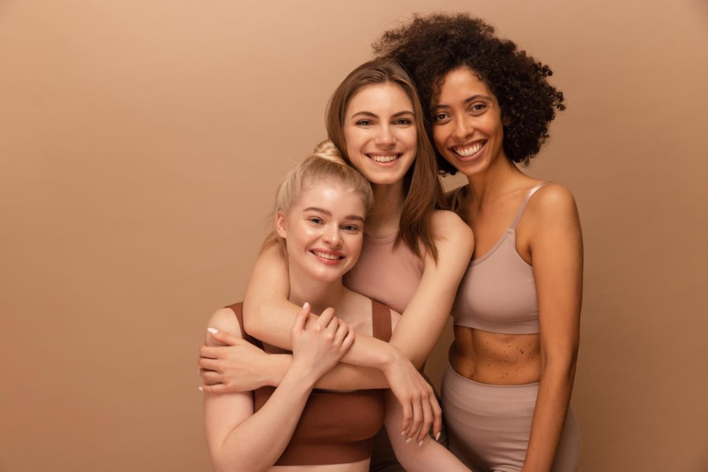 Three women after body contouring treatment