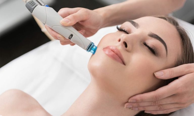 Hydrafacial treatment along the cheek