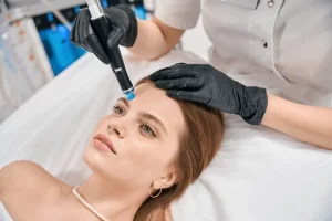 Hydrafacial treatment on the forehead